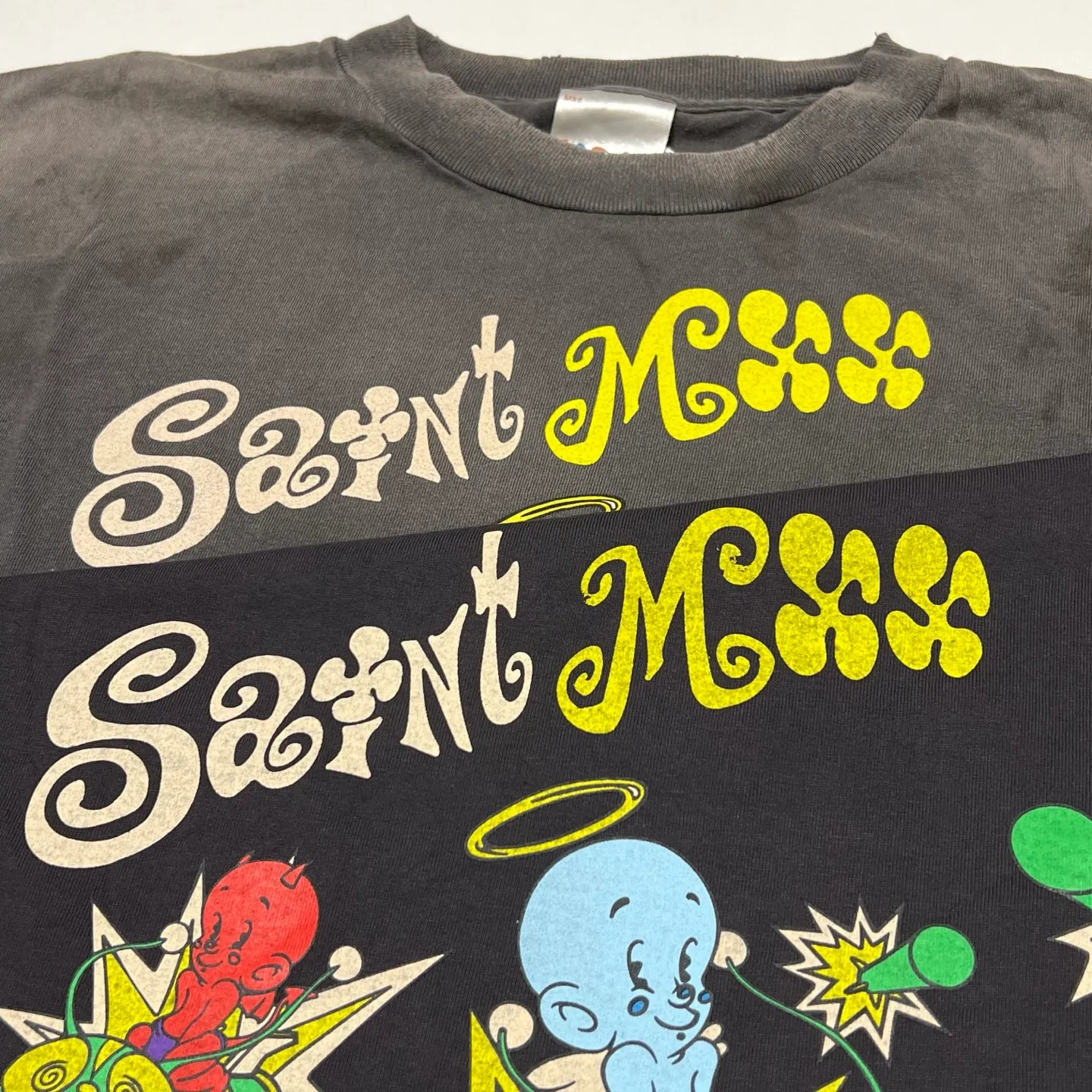 Printing proofing SAINT Mxxxxxx SS TEE/SAINT MX6/BLK Little devil bee distressed TEE Washed black S-XL Tube fabric Assute garment dyeing Rewashed and faded to make old holes Correct version Original consistent main mark/washed mark/cherub mark Original consistent printing restoration Distressed treatment Top purchasing level